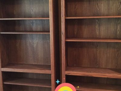 Two wood Bookcases 6’ high 3’ wide 12 inches deep with six shelves in each.  Good condition.  $50.00