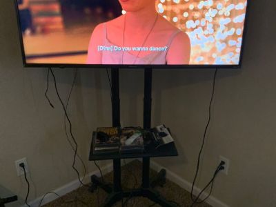 Tv stand 50 inch smart flat screen and sound bar with sub