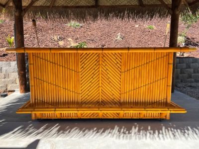 Bamboo Tiki bar with storage cabinets, outdoor patio and deck dining table