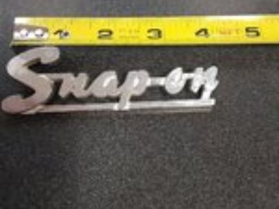 Snap-on 1950's-1960's chrome script toolbox badge. KN 100