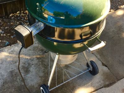 Weber charcoal grill with rotisserie