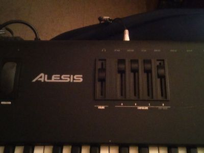 Selling A Alesis QS8 64-Voice/88-Master Controller Synthesize Keyboard With Protec Soft Case