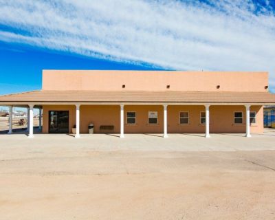 Incredible  opportunity to own an established commercial office building and vacant lot