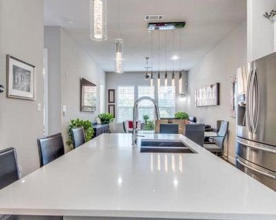 5015 Meridian Ln. Gourmet Island Kitchen with SS Gas Range and Appliances, including Refrigerator. Stacked Washer and Dryer included in Utility Closet. Open to Dining and Living Areas, including Balcony overlooking the POOL. Gas Fireplace with Elegant Stone Mantel. Flat Screen TV in Living Room included! Fabulous Master Suite and Spa-like Bath! Seperate Shower and Huge Walk In Closet. Pull Down...