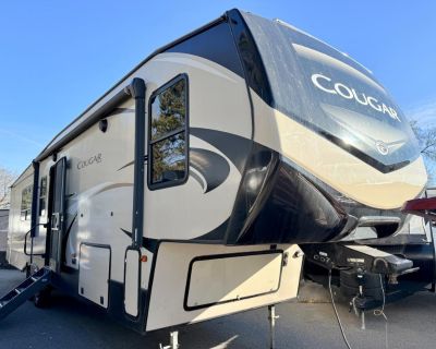 2019 Keystone RV Cougar 362RKS, Keystone Cougar fifth wheel 362RKS highlights: Rear Kitchen Breakfast Bar Free Standing Dinette Shower Seat Theater Seating Been searching for a full-time fifth wheel with a rear kitchen layout including a breakfast bar and plenty of space to prepare meals for overnight guests? This Cougar has you covered! You can even watch the 50" LED HDTV with a fireplace belo...