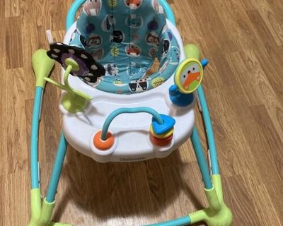 Baby walker that can be sit in or pushed around Ed to aid walking