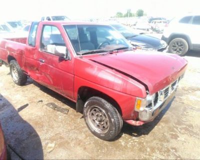 Salvage Red 1993 Nissan Truck