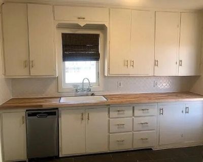 1507 Wabash St. Come see this great 2 bedroom 1 bathroom house with hardwood floors and lots of windows! This home features butcher block countertops and a unique backsplash in the kitchen, as well as a great backyard with lots of space! The living room features a fireplace that makes a great focal point for the room. The front of the house features a great pergola where you could set up chairs...