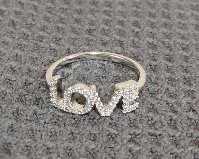 Solid 925 stamped Sterling Silver Ring. 
Main stones: Moissanite (high quality). 
Size 7

Promise, Engagement, and Fashion Style Women's Ring

If interested, please message TJ to schedule a transaction. Thank you.