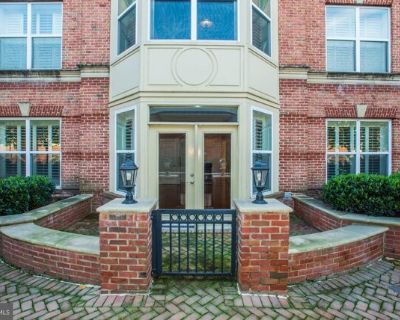 320 S West St Apt 105. Experience the best of Old Town Alexandria living! Enjoy the charm of cobblestone streets, waterfront parks, and vibrant local cafes, boutiques and restaurants, all just steps from your door. This beautifully appointed condo offers elegant details and modern comfort throughout, featuring gleaming hardwood floors, crown molding, wainscoting, and a cozy three-sided gas fire...