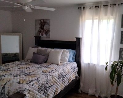 This is my cozy comfort corner houbeautiful neighborhood people stay to themselves the house is cozy anybody that lives here is going to love it I have amazing and loving pets you can utilize the kitchen and the living room So you don't have to be stuck in your room it is close to Nas Pensacola and Corey station there's Walmart McDonald's in a nature park and the water. 1 Bedroom. 2 Bathroom