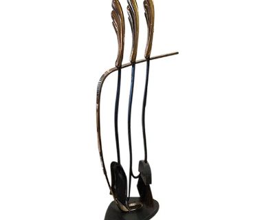 This is a fireplace tool set attributed to Niel W. Peper. We do have a matching set of Andirons in another listing. We do have another pair signed Niel Peper andirons and tools from the same house on another listing, so pretty sure these are from him, however this pair isn't signed.. Dimensions 6.5 W 10 D 33 H Styles Art Deco Period 1960s Country of Origin United States Item Type Vintage, Antiq...