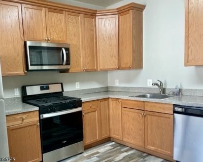 145 Conover Ter, 145. Third floor unit. Light and Bright with 2 bedrooms, 2 full baths, laundry in the unit. The primary bedroom has an ensuite. A hall bathroom serves the 2nd bedroom. Open kitchen to the dining and family rooms. Note there are only two flights of stairs, one external to front door and then one internal to living area. There is a garage and driveway parking.. 2 Bedroom. 2 Bathroom