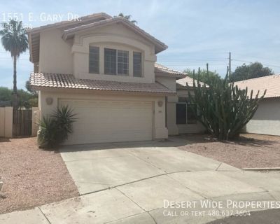 1551 E. Gary Dr.. 3 B/R + LOFT (DEN) AND FAMILY ROOM. BRAND NEW FLOORING. WOOD BLINDS, LARGE MASTER BR W/SITTING AREA & WALK-IN CLOSET. CEILING FANS. VAULTED, COVERED PATIO, GARAGE DOOR OPENER. To Schedule a Tour please visit www.Desertwide.com and click Schedule a Tour under the property listed. This property is offered by Desert Wide Properties Group and is Brokered by Southwest Property Sale...