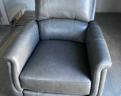 Synergy Grey Top Grain Leather Pushback Recliner. Reclines almost flat.