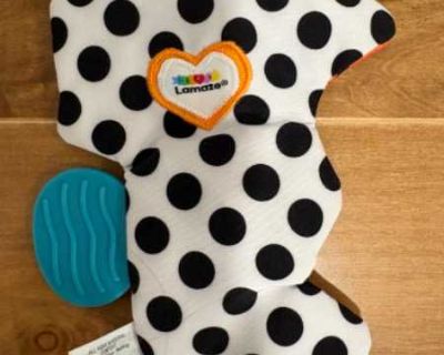 SEYMOUR THE SEAHORSE - Lamaze Crinklies Baby Toy Gently used by one baby. Machine washable! Description from mamasfirst.com Bright colours and contrasting patterns provide your baby with visual stimulation while the different textures and interesting sounds help encourage tactile skills and fine motor skill development. Grab Seymour the Seahorse and go! His flat design is easy to take along any...