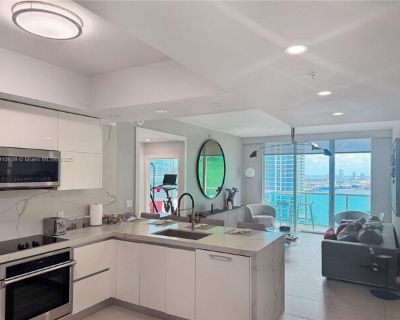 31 SE 5th St Apt 3412. Experience luxury living in this fully remodeled 3-bedroom, 2.5-bath corner residence at Brickell on the River. Enjoy breathtaking bay and city views from every room, with floor-to-ceiling windows showcasing the stunning northern skyline. Designed with the highest standards, this modern home features a sleek open kitchen, premium finishes, and spacious living areas ideal ...