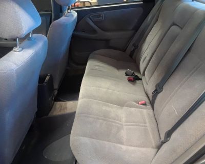 Dependable Toyota Camry in good condition, comes with a Thule roof rack system and bike racks. Solid commuter.