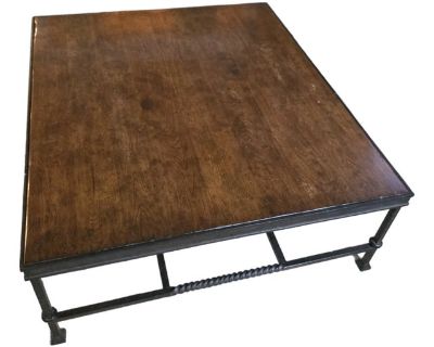 Large coffee table from Paul Ferrante in a beautiful walnut with an iron base. Measures 52x60 x 20h. Dimensions 52 W 60 D 20 H Styles Traditional Transitional Table Shape Rectangle Brand Paul Ferrante Period 2010s Country of Origin United States Item Type Vintage, Antique or Pre-owned Shop Sustainably with Chairish Materials Walnut Condition Good Condition, Original Condition Unaltered, Some Im...