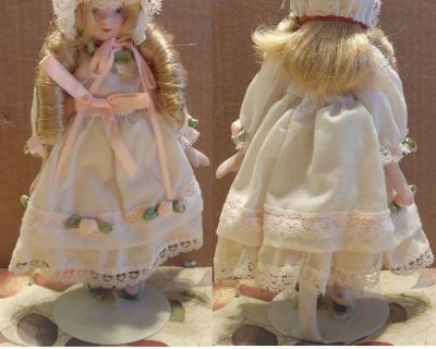 8 1/2" tall No Markings Porcelain Doll