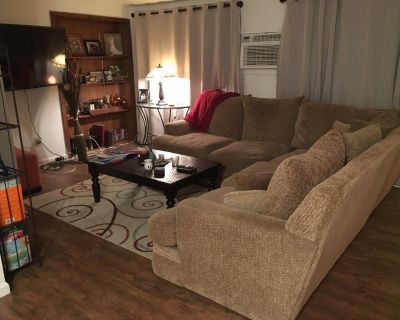 This is a 3 bedroom, 2 bath house with a pool, herb garden and a garage for some storage and a large empty work table with a lot of space for tools. There's a washer/dryer and extra shared fridge in the garage. Two rooms are occupied by one other person and myself. The room 10 x 11.5 is unfurnished and the bathroom is shared with the other roommate (male). The house is in an excellent, quiet ne...