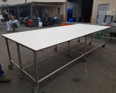 5' x 12' bakery or work table on stainless steel frame with casters