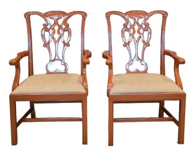 Pair of Chippendale style chairs in a beautiful lacquered finish the color of paprika and upholstered textured woven fabric. Great as dining chairs, at a game table, occasional chair in a living room or office - striking finish and very versatile.. Dimensions 24.5 W 23 D 41.5 H Styles Chippendale Arm Height 27.0 in Number of Seats 2 Seat Interior Depth 21.0 in Seat Interior Width 21.5 in Seat H...