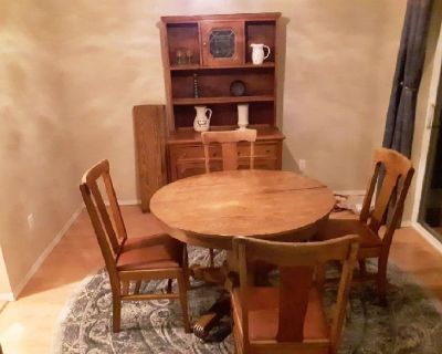 Antique buffet hutch and matching table with four chairs