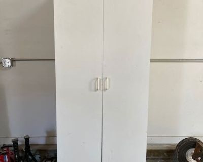 tall white cabinet