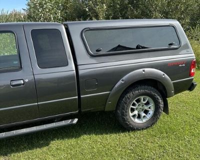 2011 Ford Ranger Sport 4wd with matching Unicover and only 28,000 miles