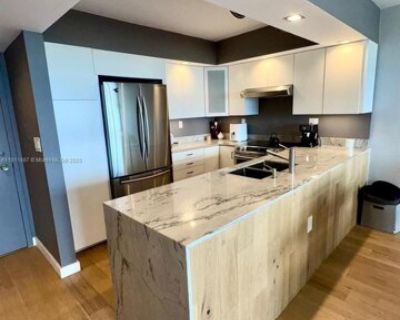 2150 Sans Souci Blvd Unit A1203. Rare opportunity! The only one-bedroom unit available with stunning water views at 2150 Sans Souci Blvd. Enjoy breathtaking panoramic vistas of the Intracoastal, the ocean, and the city skyline stretching from Hallandale to South Beach. This beautifully furnished apartment is move-in ready, featuring a bright and spacious layout, modern finishes, and a private b...