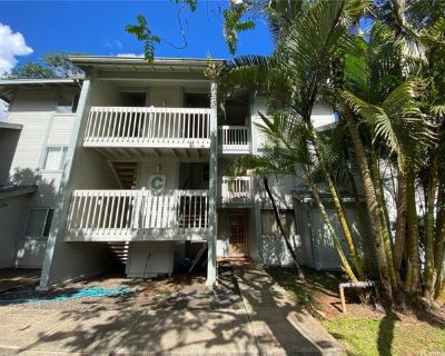 95-528 Wikao St Apt C104. For any questions or to schedule a showing, please email us your availability AVAILABLE ON DECEMBER 01, 2025 -- HI Roots Realty presents this single-level 2 BR, 1 BA with 1-car parking townhome tucked away in a quiet community near Mililani Mauka. This ground floor unit features mountain/garden views, window ac, ceiling fan and covered lanai right along the Waikakalaua...