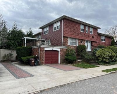 215-06 23rd Ave Unit 2. Like a Whole House Rental, this Triplex 4 bedroom/2.5 bathroom + basement features approximately 2622 sq.ft. Renovated throughout including Eat-In Kitchen and Bathrooms, recessed lighting, hardwood floors and washer/dryer. Neat and Clean, spacious rooms, Terrace + Balcony, garage parking + 3 additional parking spaces. Move right in!. 4 Bedroom. 2.5 Bathroom. 2622 ft