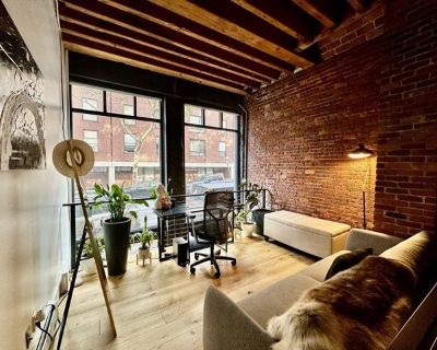 122 Fulton St Unit 1. Welcome to where the Waterfront meets the North End! Sprawling 1, 640 SF brick-and-beam loft-style apt offers 2 dramatic lvls blending historic charm w/ modern design. Striking entry opens to flexible bonus space w/ oversized windows-ideal for home office, guest rm, or gym. Opposite side features BR that fits a king bed, good closet space, and bath w/ tiled shower, deep so...