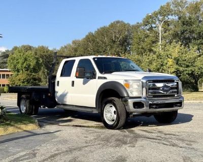2014 Ford F-550 Super Duty 4x4 Crew Cab 11-Foot Flat Deck Truck