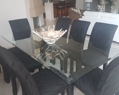 Glass dining room table and 8 chairs