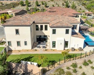 20120 Jubilee Way. Stunning luxury estate with panoramic views, ideally positioned at the end of a peaceful cul-de-sac in the exclusive, 24-hour guard-gated Westcliffe at Porter Ranch community. One of the larger properties in the neighborhood, this impressive Spanish Colonial Palisades model by Toll Brothers offers 5, 710 square feet of refined living space, featuring 5 bedrooms, 5.5 baths, an...