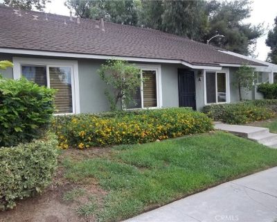 5417 E Pine Ridge Way Apt A. Ground level end unit with no one above. Updated kitchen with beautiful dark wood cabinetry and granite counter tops. Over range microwave. Under cabinetry lighting. Laminate flooring through out. Tile flooring in kitchen, bath and laundry room. Good sized living room with plantation shutters and sliding glass door to enclosed patio. Wall receptacles already in plac...