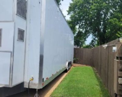 2015 Motorsports Aluminum 3 Car Trailer This 2015 Motorsports Aluminum 3-Car Trailer is a high-quality, 36-foot trailer built to haul with ease and efficiency. The trailer has a 24,000 lb capacity and is equipped with a Mini-5th Wheel Hitch for smooth towing. It features a 12,000 Power Tech generator, heat and air conditioning, and sliding double doors for convenience. The trailer also comes wi...