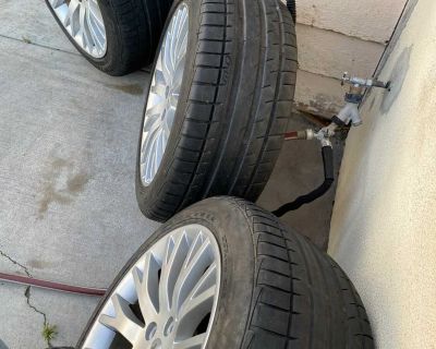 Massarati 18 inch wheels with hood tires like new