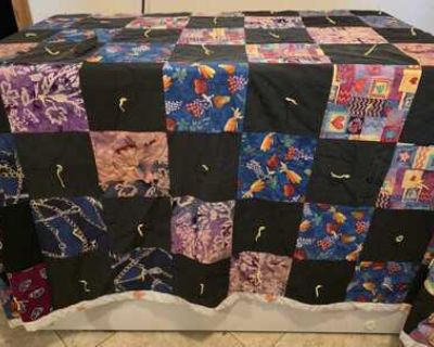 Handmade Patch work Quilt with fabric squares, some solid black and others with co