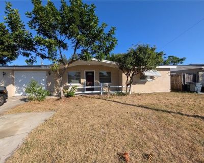 5015 Overton Dr. This cozy 2-bedroom, 1-bath single-family home offers comfort and convenience in every detail. Enjoy easy-care tile flooring throughout and a functional galley-style kitchen with plenty of cabinet space. The bright living area opens to a large screened-in porch, perfect for relaxing or entertaining outdoors year-round. The home also features ample natural light, a spacious yard...