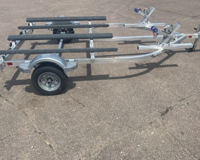 Discover the versatility of the Triton Double PWC Trailer LTWCII-X. This New 2025 Triton Double PWC Trailer LTWCII-X Multi Use offers a reliable solution for transporting your personal watercraft. Experience ease of use with a well-designed trailer that ensures stability during transport. Its construction promotes confidence on the road while accommodating your watercraft securely. Perfect for ...