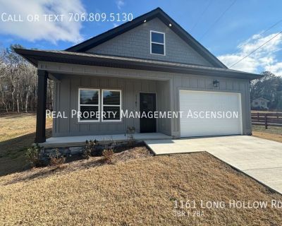 1161 Long Hollow Rd. Don't miss out on this 3 bedroom 2 FULL Bath. If you're looking for convenience then look no further. This new construction has custom features such Custom Blinds, as Single Car Garage Door. Granite Counter Tops Throughout, Stainless Steel Appliances, Back Splash, Custom LVP Floors, Custom Tile Showers, Crown Molding and Custom Window and Door Molding, Oversized Laundry, an...