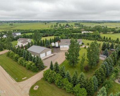 FOR SALE! Beautiful home & shop on beautiful treed lot just minutes from Bismarck!