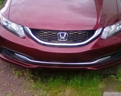 2015 Honda Civic EX Sedan.  ( low mileage 16k)  33mpg. City/39mpg.  on Highway.