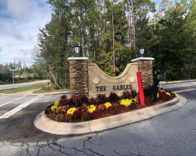 358 Scrub Jay Dr. End Unit in Gables at Wingfield - Priced to rent quickly This three bedroom, one car garage townhome is conveniently located right off of I-95 and CR210. The downstairs has a living / dining room combo, half bathroom for guests and the kitchen is equipped with a dishwasher, range, over-the-range microwave and refrigerator. All bedrooms are upstairs. NO PETS (per the associatio...