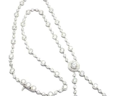 Platinum Diamond Lariat Drop Jazz Necklace by Tiffany & Co. Details: Metal: Platinum Length: 15.5" Width: 11mm, 5mm chain Weight: 23.1 grams Stones: 115 Round Brilliant Cut Diamonds VS1 clarity, E color total weight approximately 8.75ct Hallmarks: Tiffany & Co PT950. Styles Contemporary Primary Stone Creation Natural Necklace Length 15.5 in Primary Stone Diamond Primary Stone Shape Round Brand ...
