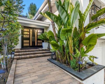 19715 Greenbriar Dr. Welcome to this beautifully remodeled gem located south of the Boulevard in Tarzana. From the moment you arrive, you'll be drawn in by the stunning curb appeal, lush landscaping, and soaring palm trees that frame the entrance. Inside this spacious home offers 4 bedrooms and 4 bathrooms, with an open-concept layout designed for both everyday living and entertaining. The gour...