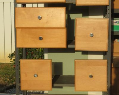 Maple finish.  Sturdy.  9 drawers, 2 doors, slider  
 tracks on sides of drawers,  also granite counter top for bathroom with fixtures and 2 black granite slabs.  Must see!!  4911 Coral Blvd.  Bradenton, 34210  Buy all or any part of this.  Can't show it all here.